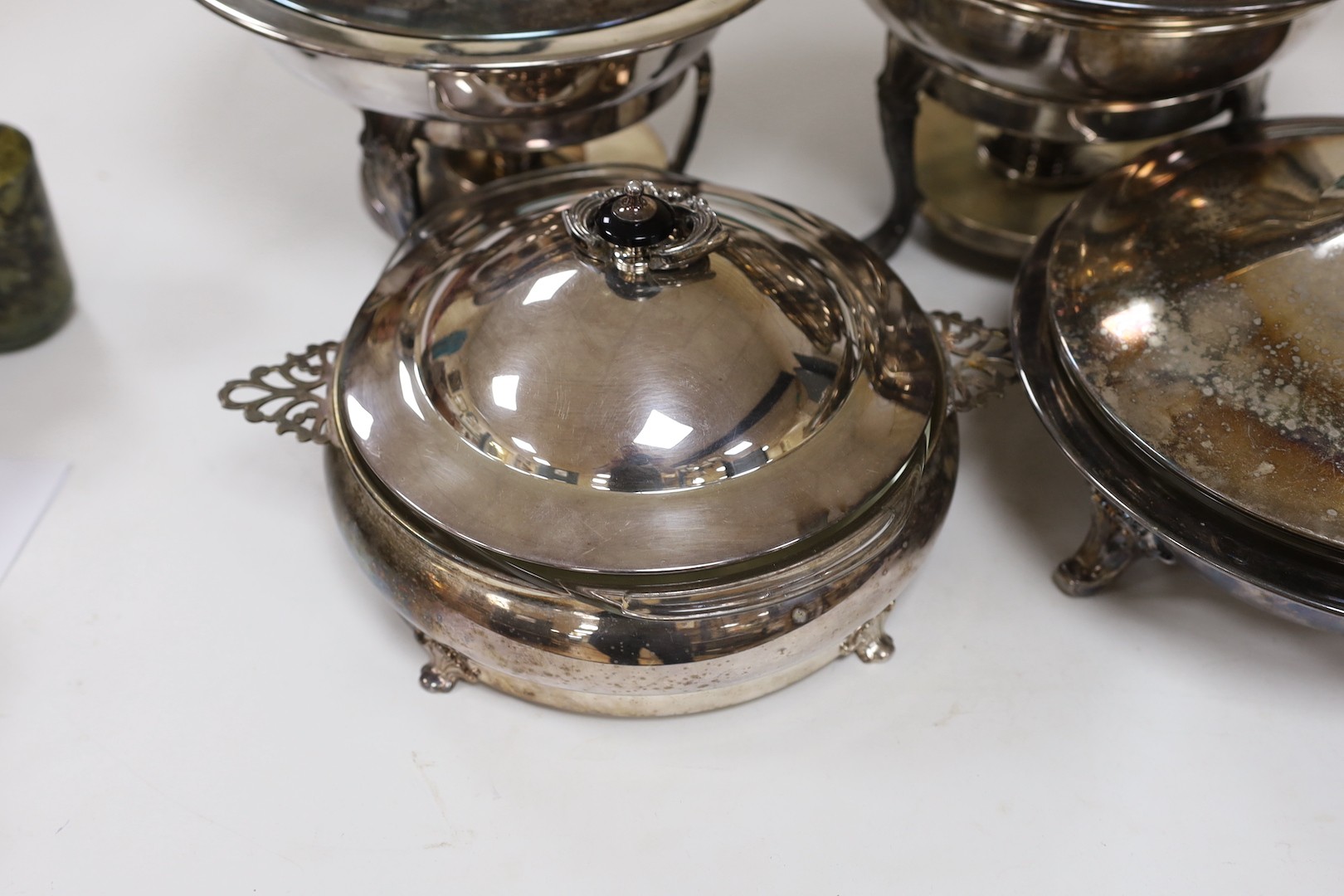 A pair of silver plated bain marie and two matching tureens with covers